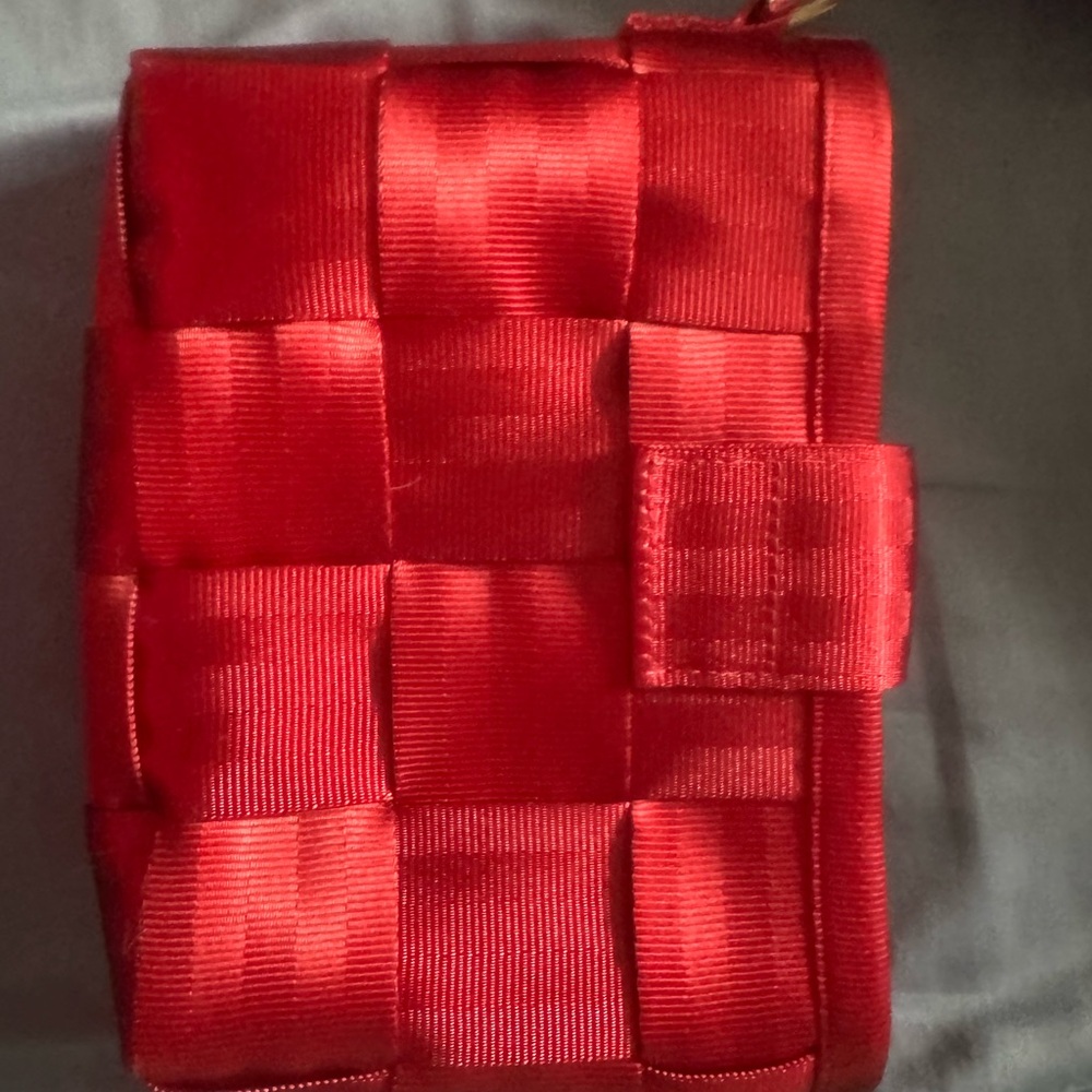 Harveys red pouch, does not come with strap